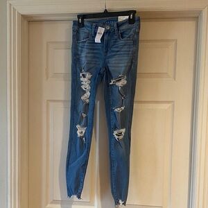 American Eagle Outfitters Ripped Blue Skinny Jeans Sz 4 (27).  NWT